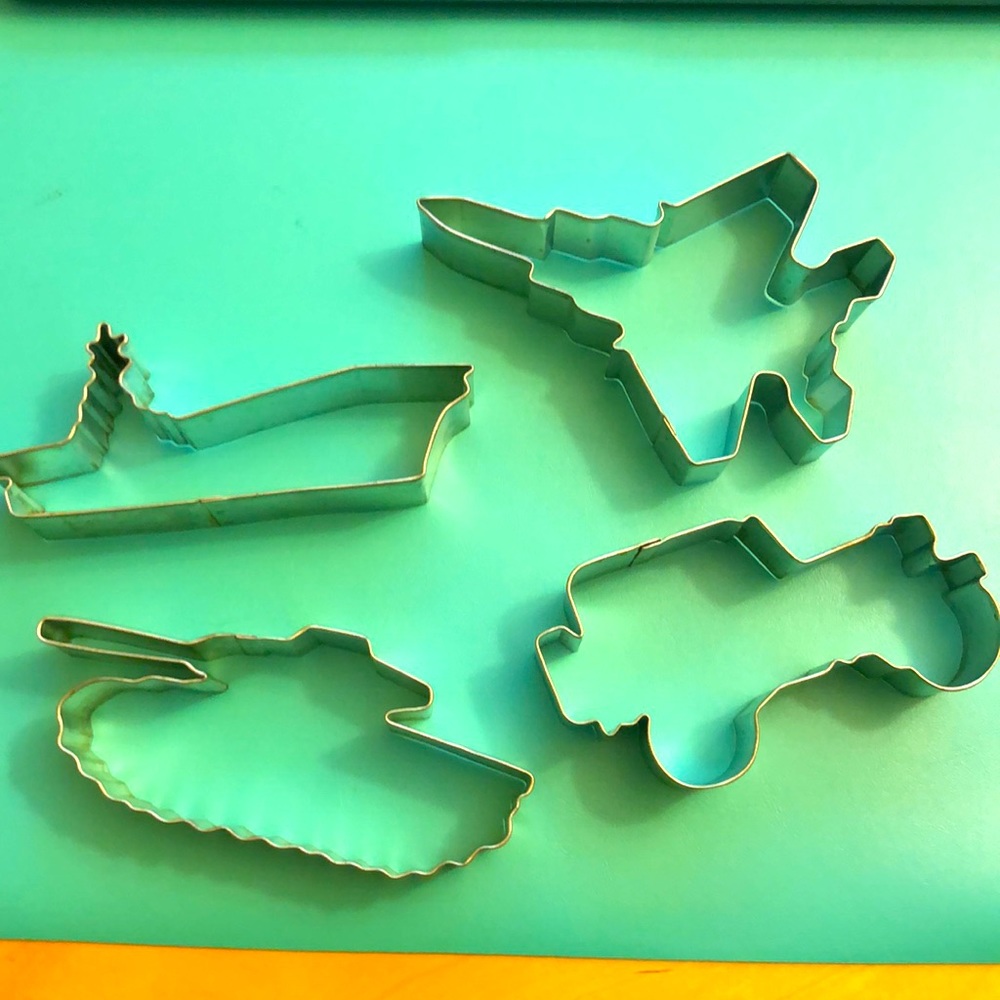 4 cookie cutters: battleship (Navy) tank (Marines) Jeep (Army) jet (Air Force)